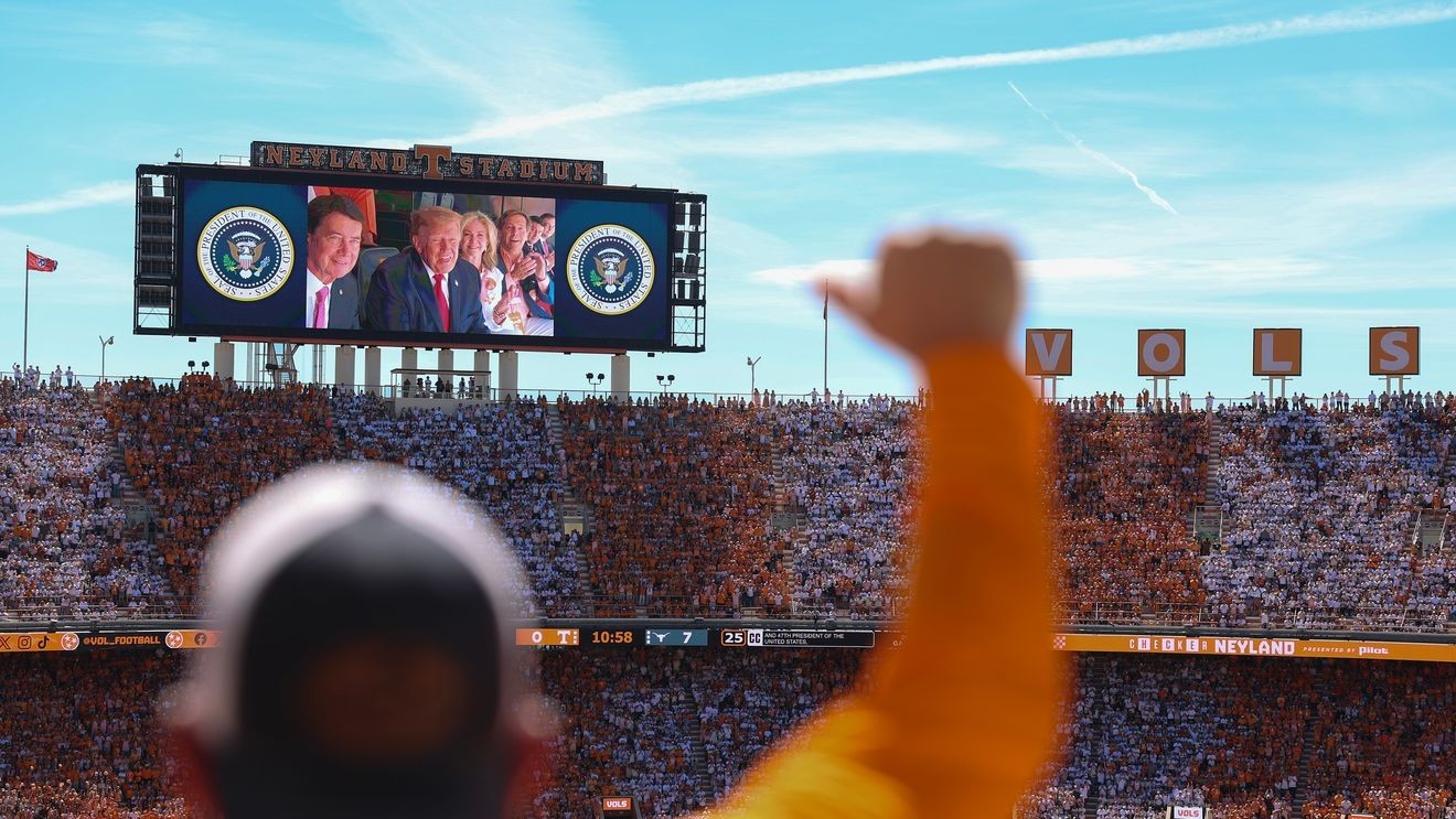 College football fans welcome Trump, <i>Air</i> Force One flyover with cheers at big game